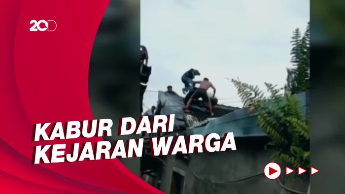 Dramatis! Pelaku Curanmor Dikeroyok Massa di Atas Atap