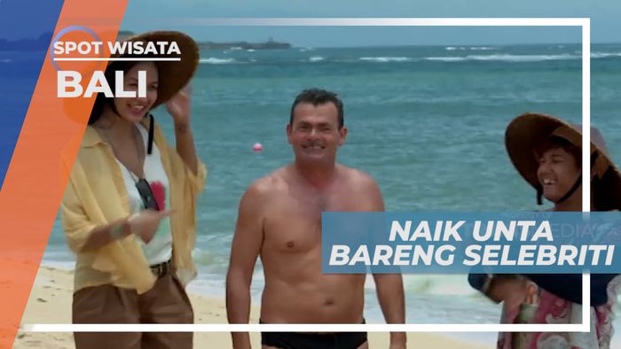 Berinteraksi dengan Wisatawan Asing di Pantai Nusa Dua, Bali