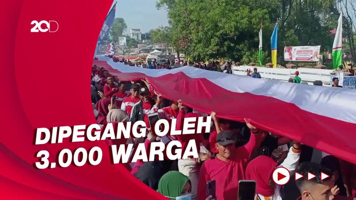 Kirab Bendera Merah Putih 2.510 Meter di Jambi Pecahkan Rekor Muri