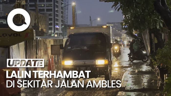 Jalan di Olimo Jakbar Ambles, Arus Lalu Lintas Terhambat