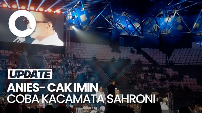 Gaya Anies-Cak Imin Coba Kacamata Sahroni di Acara Resolusi Indonesia  