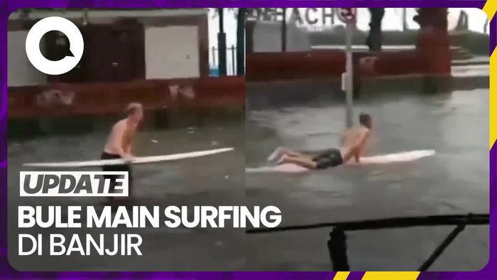 Aksi Bule Asyik Main Surfing di Jalan Saat Bali Dilanda Banjir
