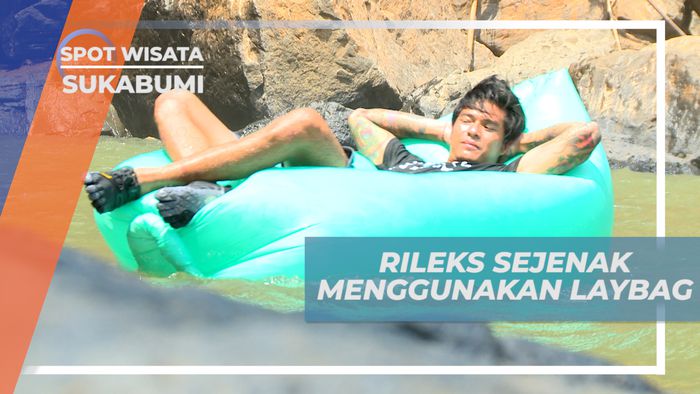 Rileks Sejenak Menggunakan Laybag di Kolam Alami Air Terjun Cimarinjung, Sukabumi