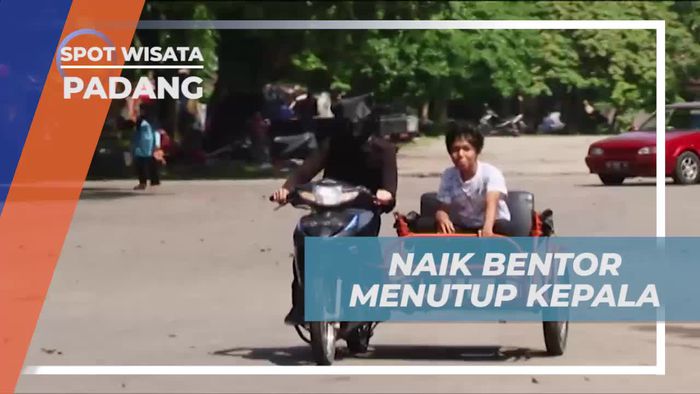 Mengendarai Bentor Sambil Menutup Kepala di Padang     