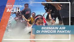 Bermain Air dan Bersenda Gurau di Pantai Pasir Putih Aceh untuk Mengakhiri Perayaan Kemerdekaan  