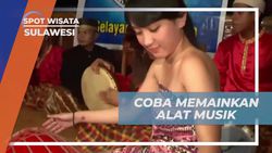 Mencoba Memainkan Alat Musik Tradisional sebagai Sambutan di Sulawesi  