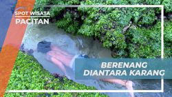 Serunya Berenang di Antara Karang Pantai Jantur, Pacitan