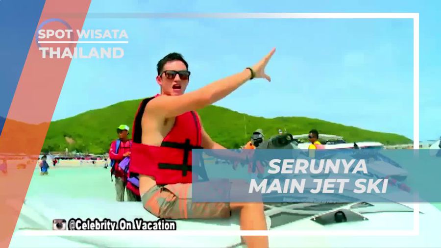 Bermain Jet Ski di Pantai Coral Island, Thailand